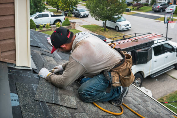 Professional Flat Roof Repair technician working in Deadwood, OR